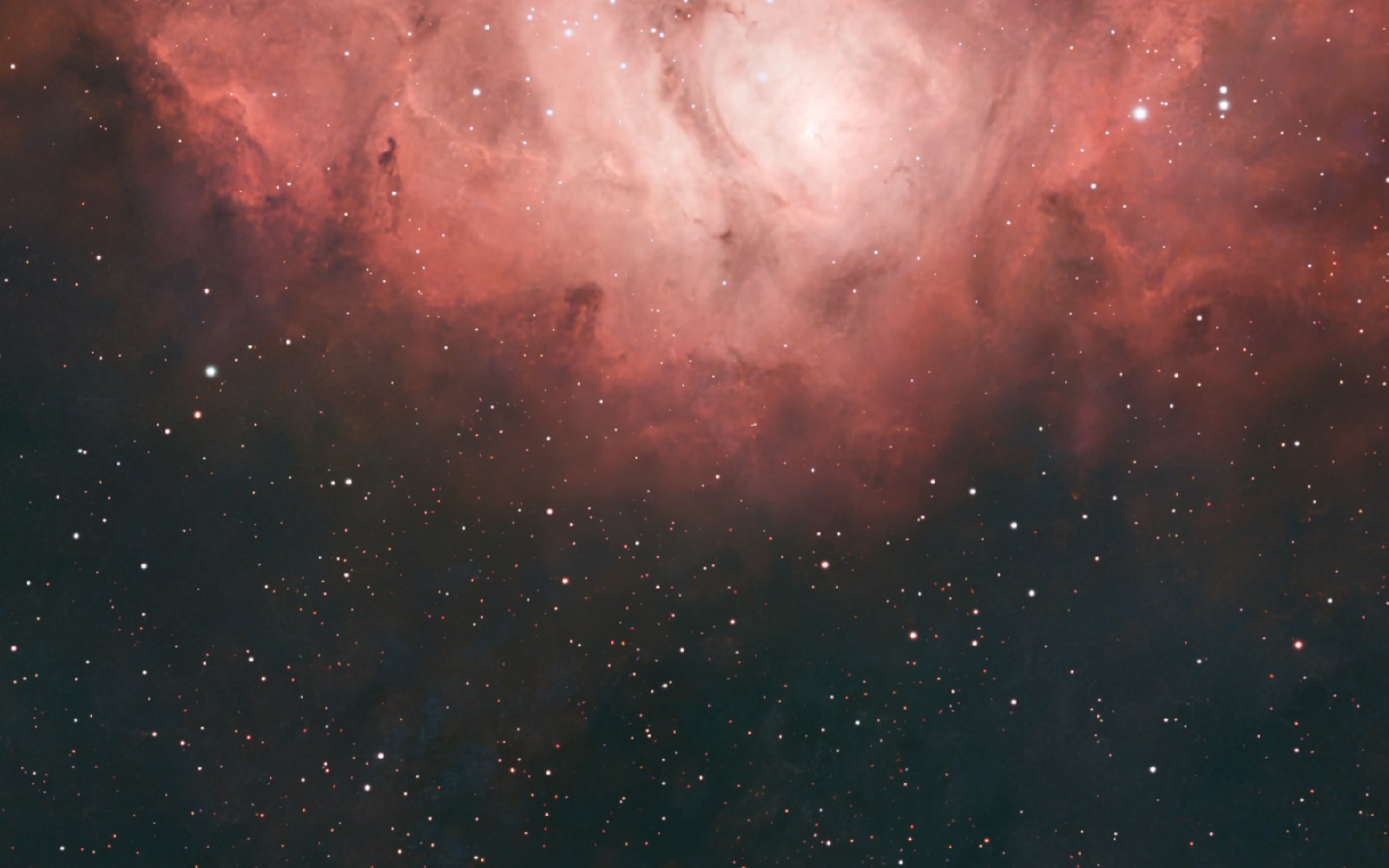 The same field with the stars pulled back so the nebula reads