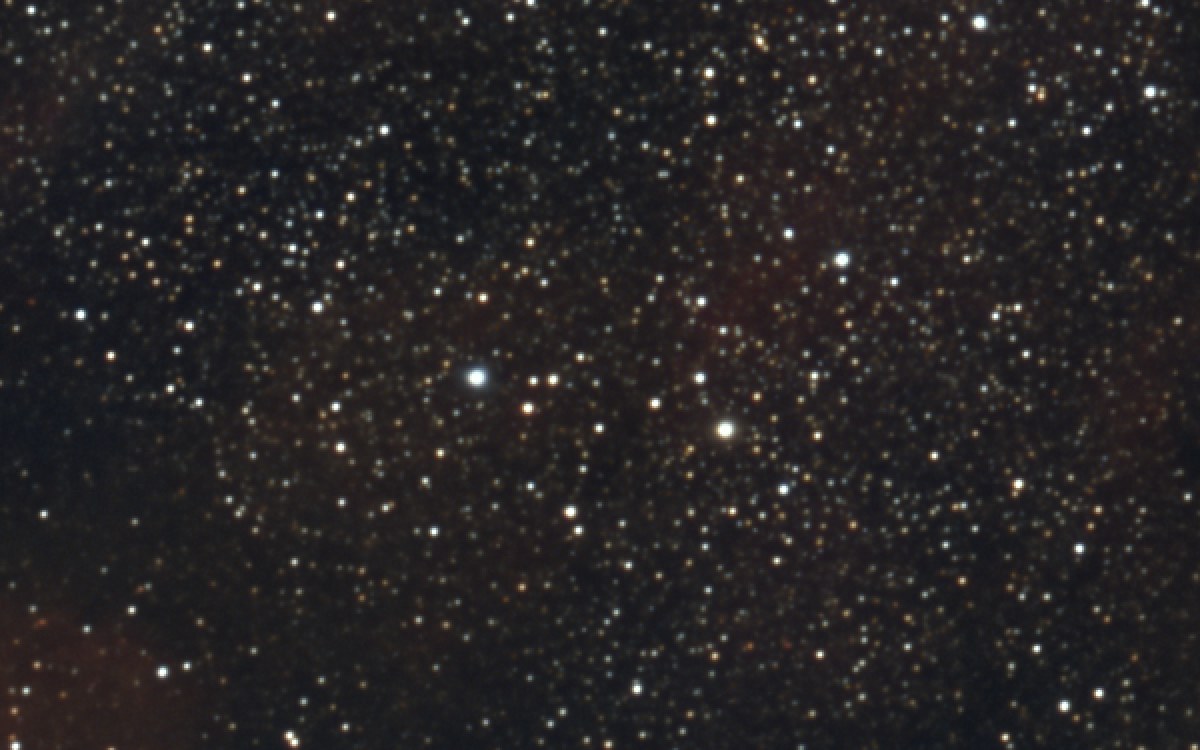 The same patch at 100% after Noise Reduction: smooth sky, sharp stars